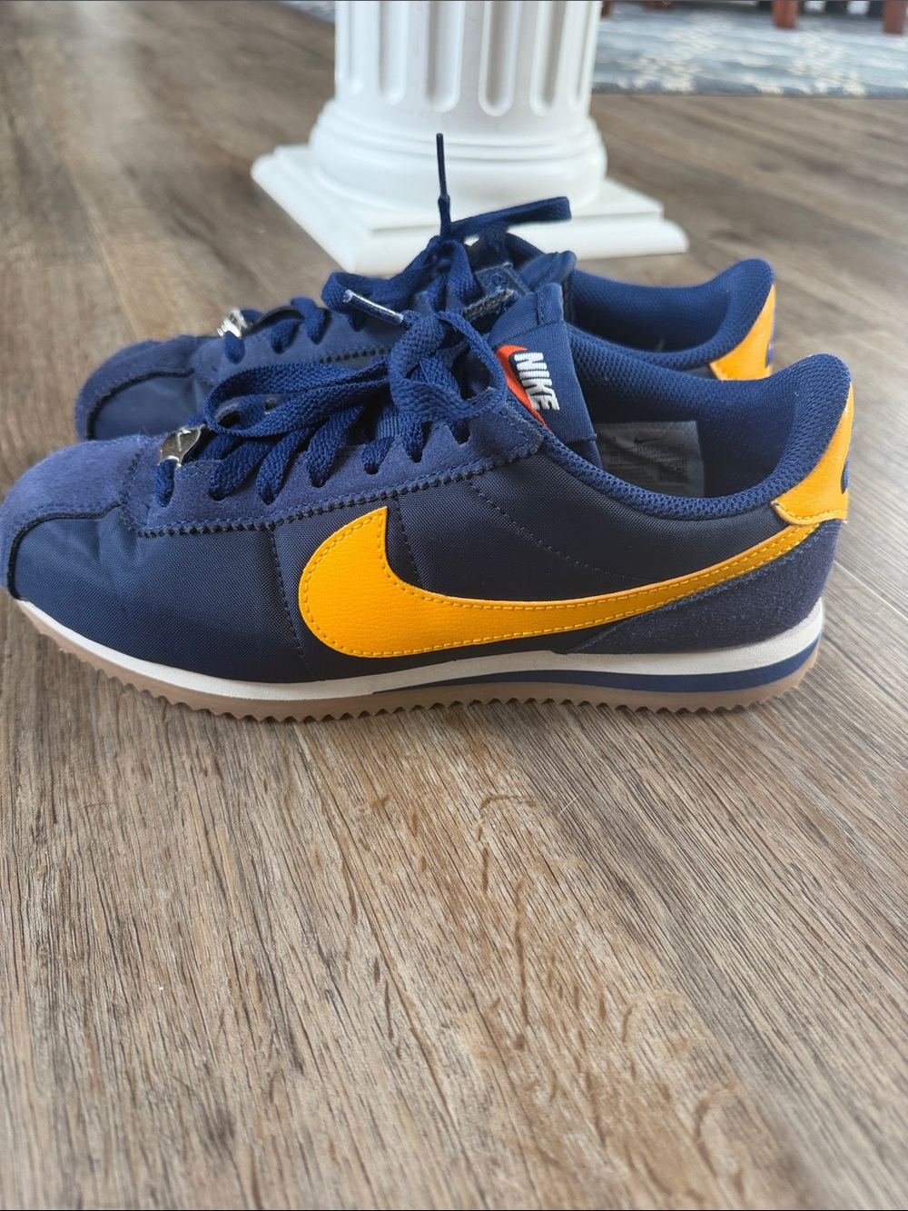 Nike women’s navy and Yellow Retro Runner Sneakers